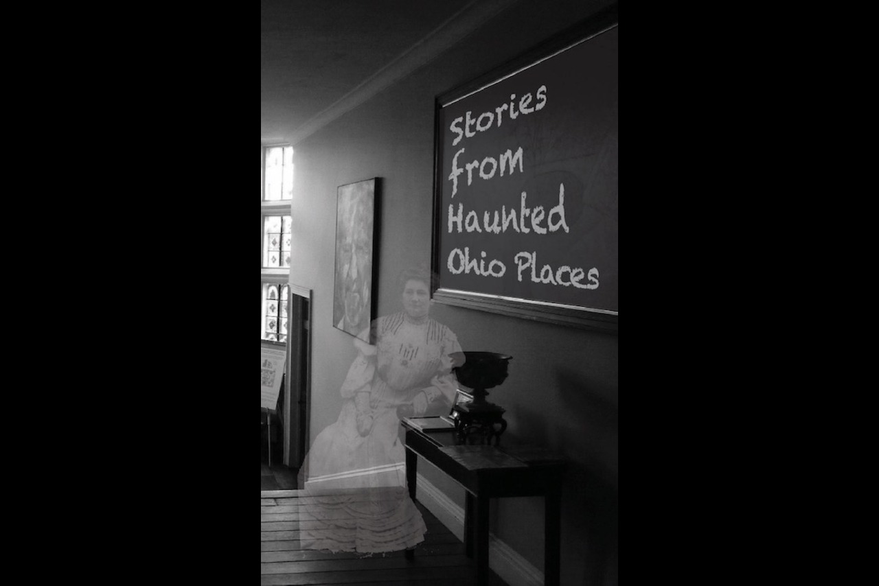 Picture of an old-fashioned parlor with a ghost of a Victorian lady sitting in a chair