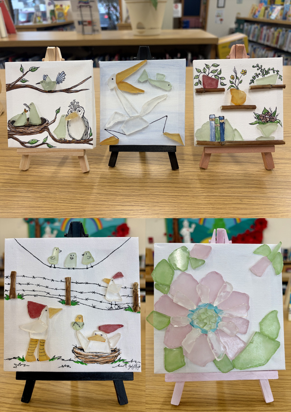 Five mini-canvases with sea glass and drawings on them