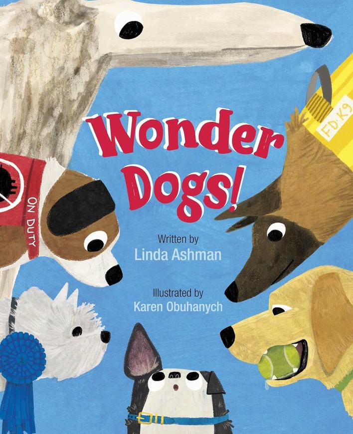 Many different breeds of dogs arranged along the outside of the cover with the words Wonder Dogs! in the center